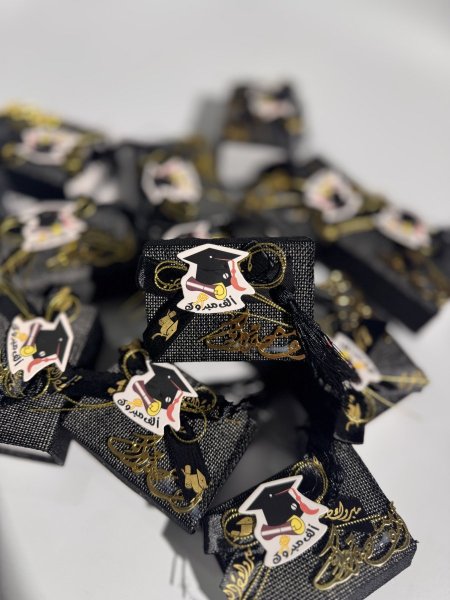 توزيعة تخرج قماش