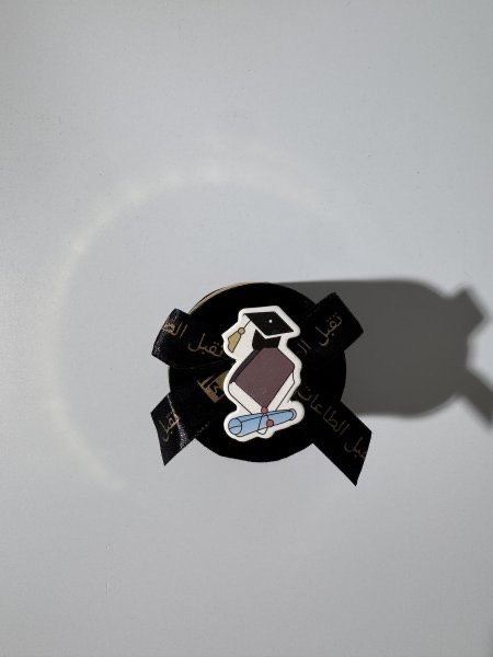 توزيعة تخرج دائري اسود