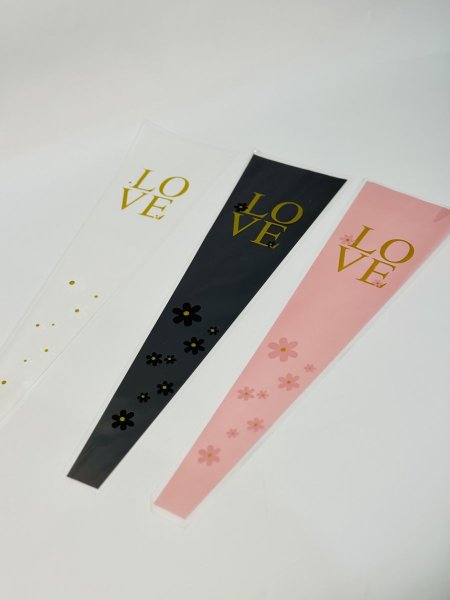 اكياس تغليف للورد وجه شفاف مع وردة دزينة 50 حبة حجم45*12