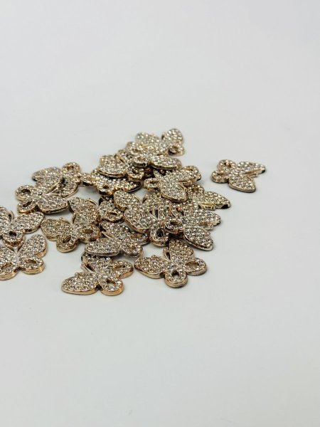 اكسسوار توزيعات شكل فراشة مع ستراس دزينة 50 حبة